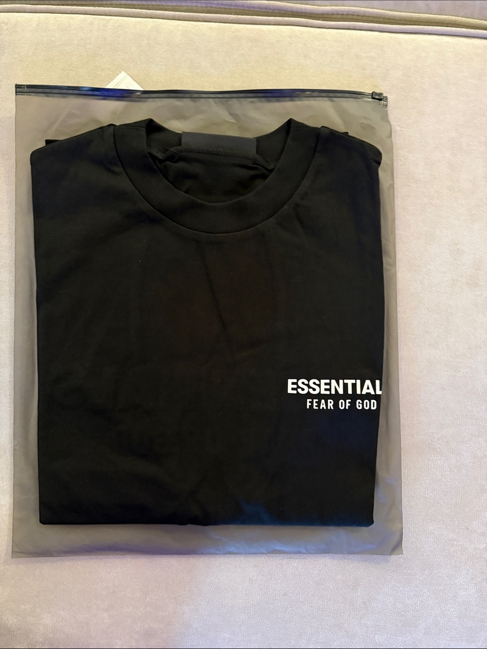 Fear of God ESSENTIALS Black Tee with Tan Hang Tags